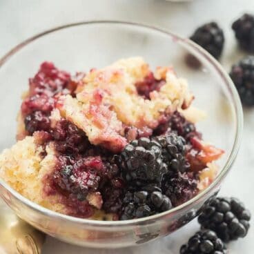 blackberry cobbler in a glass bowl