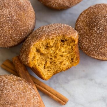 square image of pumpkin muffins with a cinnamon sugar topping